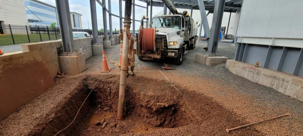 A Muller crew working on a job site doing hydro excavation following proper procedures to avoid common hydro excavation mistakes.