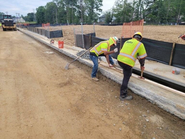 Muller, Inc. workers on a job site that utilized successful pre-construction budgeting.