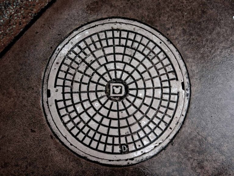 top view of a closed sewer in the ground
